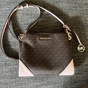 Michael Kors brown and pink purse.